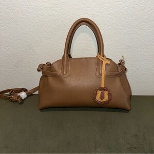 Genuine pebble-grain leather UK PAT 519246 messenger and crossbody bags.